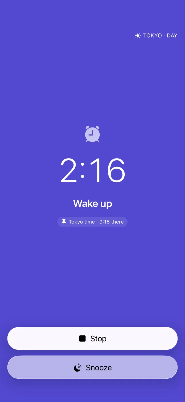 A ringing alarm with Stop and Snooze.